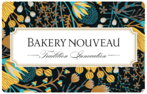 Gift card with navy blue, yellow and turquoise floral pattern. White Bakery Nouveau Logo.